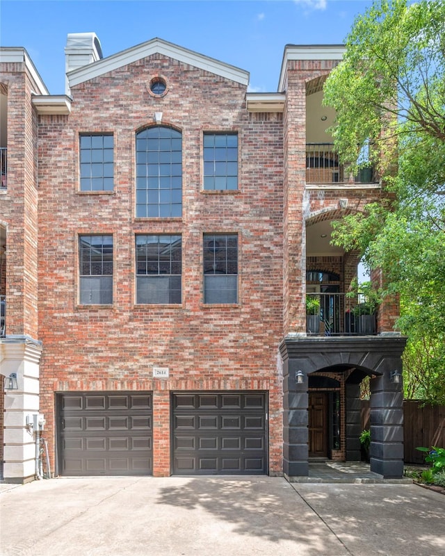2614 Yoakum Blvd, Houston, TX 77006 - view of property featuring driveway and an attached garage