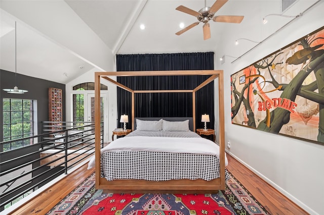 2614 Yoakum Blvd, Houston, TX 77006 - bedroom featuring vaulted ceiling and wood finished floors