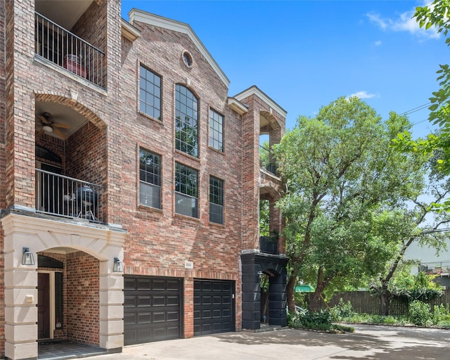 2614 Yoakum Blvd, Houston, TX 77006 - view of property featuring concrete driveway and an attached garage