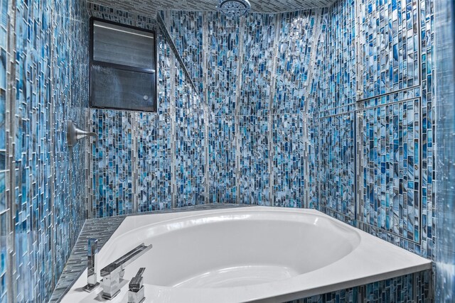 12901 E Barcelona, Galveston, TX 77554 - bathroom with a bathtub and a tile shower
