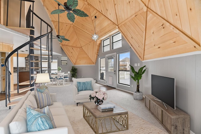 12901 E Barcelona, Galveston, TX 77554 - living area featuring high vaulted ceiling, stairs, carpet flooring, and ceiling fan