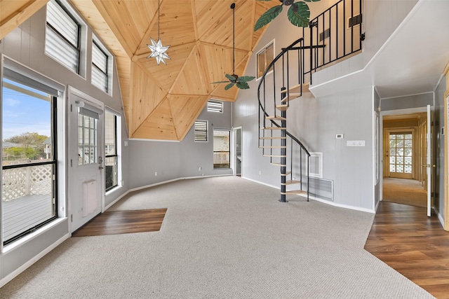 12901 E Barcelona, Galveston, TX 77554 - foyer with high vaulted ceiling, carpet floors, stairway, and wood ceiling