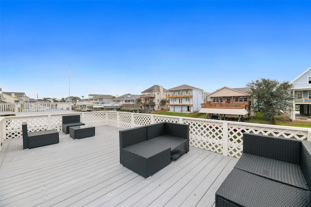 12901 E Barcelona, Galveston, TX 77554 - wooden terrace featuring a residential view and outdoor lounge area