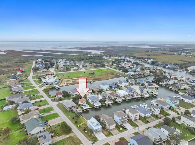 12901 E Barcelona, Galveston, TX 77554 - aerial overview of property's location featuring a large body of water and nearby suburban area