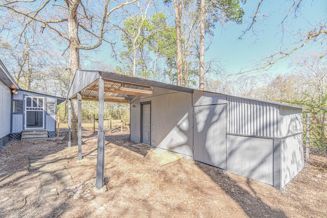 3735 Woodpeckers Grv, Cleveland, TX 77328 - view of outbuilding featuring entry steps