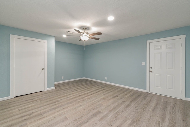 3735 Woodpeckers Grv, Cleveland, TX 77328 - empty room with ceiling fan, light wood-style floors, and recessed lighting