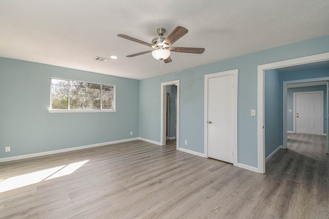3735 Woodpeckers Grv, Cleveland, TX 77328 - unfurnished bedroom with wood finished floors, ceiling fan, and recessed lighting