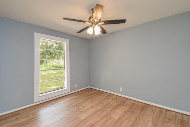3735 Woodpeckers Grv, Cleveland, TX 77328 - unfurnished room with wood finished floors and ceiling fan