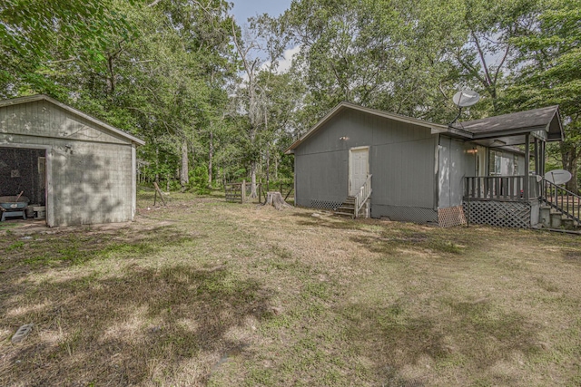 3735 Woodpeckers Grv, Cleveland, TX 77328 - view of grassy yard with entry steps