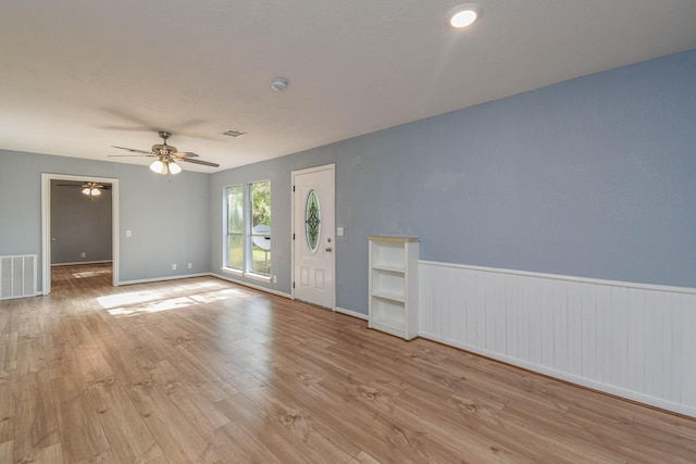 3735 Woodpeckers Grv, Cleveland, TX 77328 - unfurnished room with wood finished floors, ceiling fan, and a smoke detector