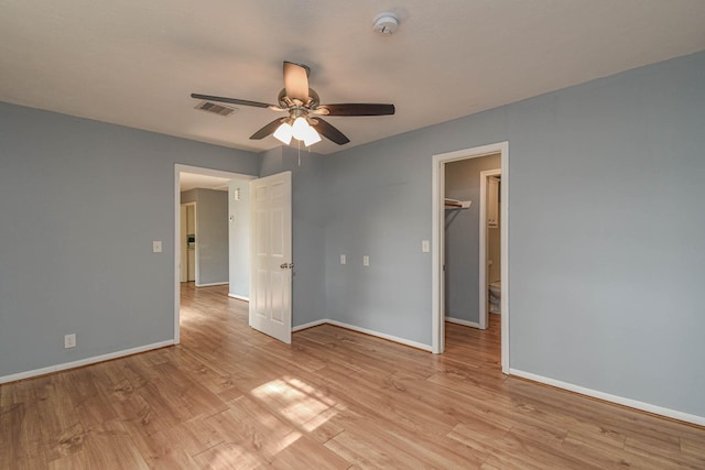 3735 Woodpeckers Grv, Cleveland, TX 77328 - unfurnished room featuring ceiling fan, light wood-type flooring, and a smoke detector