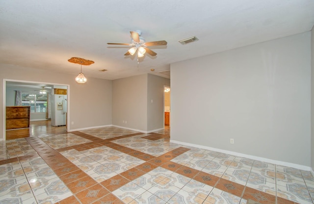 10131 Tangiers Rd, Houston, TX 77041 - empty room with ceiling fan and light tile patterned floors