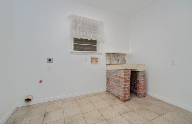 10131 Tangiers Rd, Houston, TX 77041 - washroom with hookup for an electric dryer, hookup for a washing machine, and light tile patterned floors
