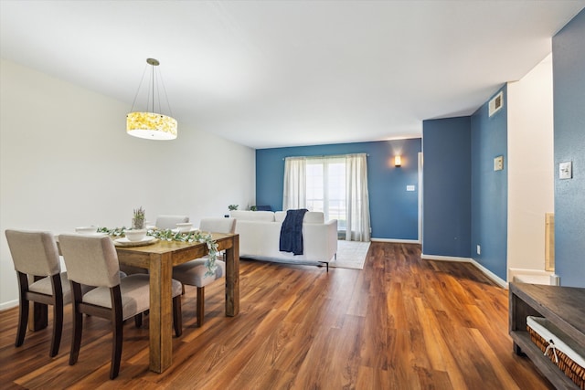 2065 Winrock Blvd Unit 55, Houston, TX 77057 - dining space featuring wood finished floors and baseboards
