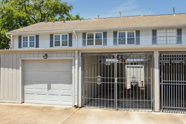 2065 Winrock Blvd Unit 55, Houston, TX 77057 - garage featuring concrete driveway