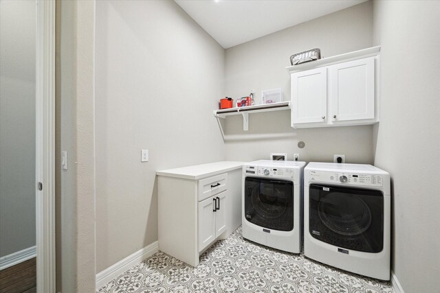 5946 Wedgewood Heights Way, Houston, TX 77059 - laundry area featuring washing machine and dryer and cabinet space