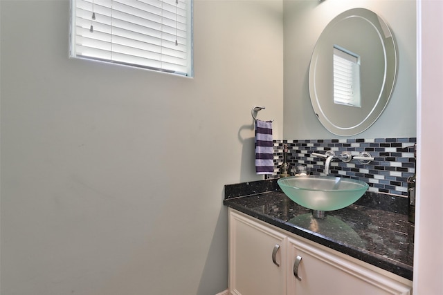 826 E 29th St, Houston, TX 77009 - bathroom featuring backsplash and vanity