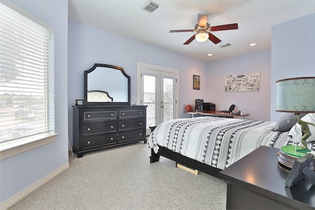 826 E 29th St, Houston, TX 77009 - bedroom with access to exterior, light carpet, and ceiling fan