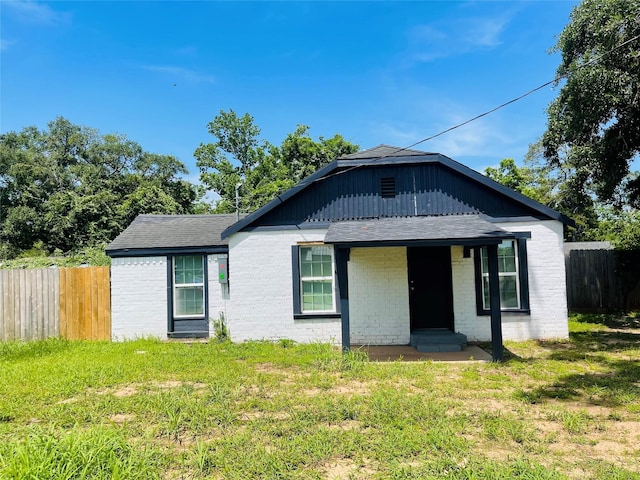506 N Hackberry St, Sweeny, TX 77480 - view of front of house featuring brick siding and roof with shingles
