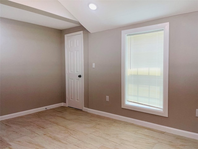 506 N Hackberry St, Sweeny, TX 77480 - empty room with recessed lighting and lofted ceiling