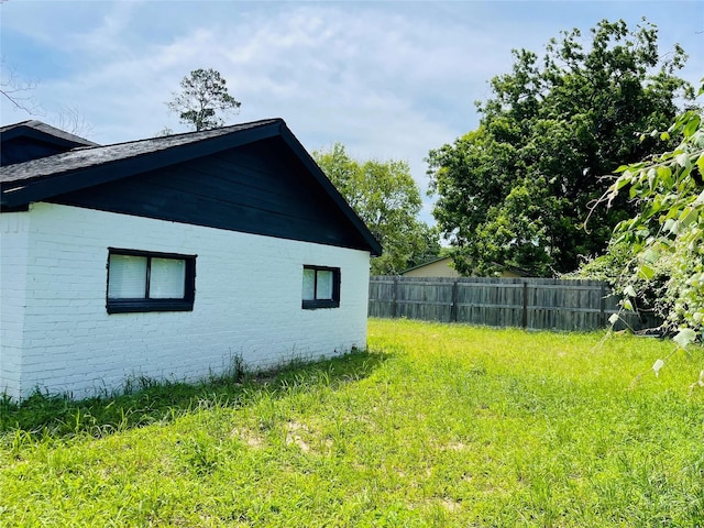 506 N Hackberry St, Sweeny, TX 77480 - view of side of property featuring brick siding