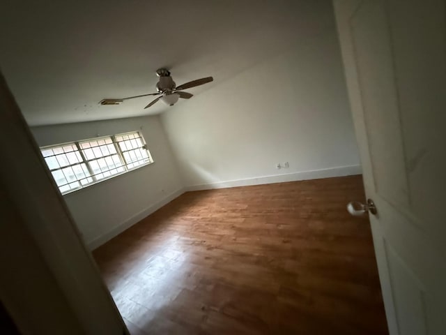 10203 Heather Hill Dr, Houston, TX 77086 - unfurnished room featuring ceiling fan and wood finished floors