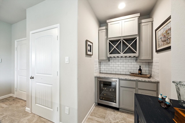2705 Veranda Vly, League City, TX 77573 - indoor bar featuring wine cooler and tasteful backsplash