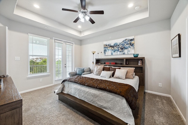 2705 Veranda Vly, League City, TX 77573 - bedroom featuring carpet, access to exterior, a tray ceiling, recessed lighting, and a ceiling fan