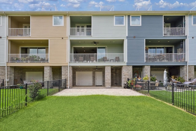2705 Veranda Vly, League City, TX 77573 - view of apartment building / complex featuring a garage and a fenced backyard