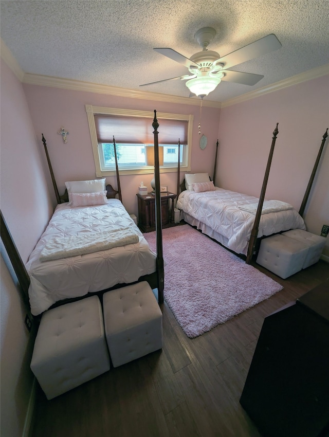 14453 Misty Meadow Ln, Houston, TX 77079 - bedroom with a textured ceiling, wood finished floors, ceiling fan, and crown molding