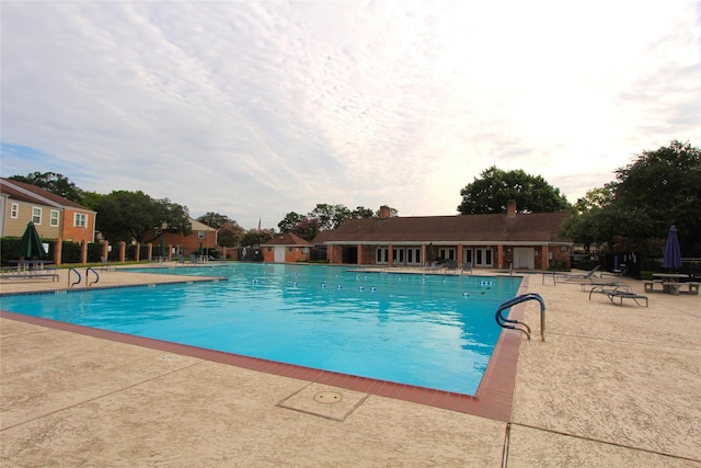 14453 Misty Meadow Ln, Houston, TX 77079 - community pool featuring a patio area