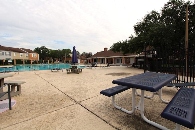 14453 Misty Meadow Ln, Houston, TX 77079 - community pool featuring a patio