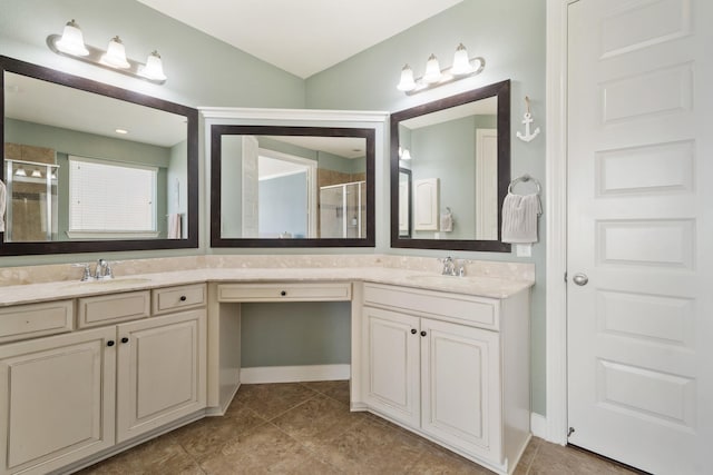 25611 Kearsley Dr, Katy, TX 77494 - bathroom with a shower stall, double vanity, and tile patterned floors