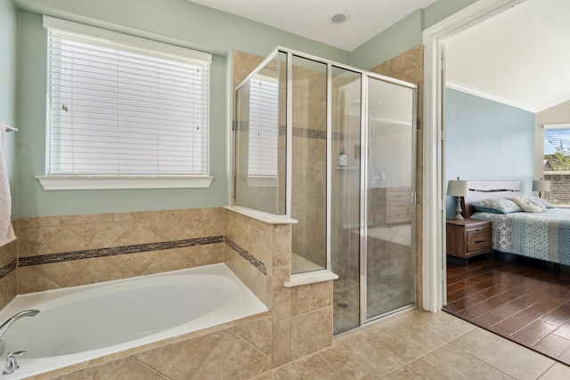 25611 Kearsley Dr, Katy, TX 77494 - full bath with a bath, a stall shower, ensuite bath, tile patterned flooring, and lofted ceiling