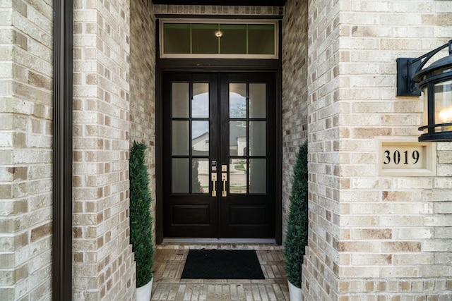 3019 Bluestem Rd, Katy, TX 77493 - doorway to property with french doors and brick siding
