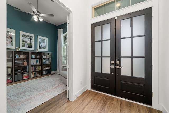 3019 Bluestem Rd, Katy, TX 77493 - foyer entrance with french doors, wood finished floors, and a ceiling fan