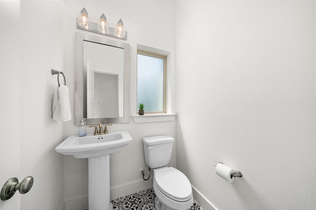 3019 Bluestem Rd, Katy, TX 77493 - bathroom with toilet and baseboards