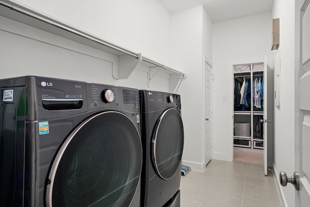 3019 Bluestem Rd, Katy, TX 77493 - washroom with independent washer and dryer and light tile patterned floors