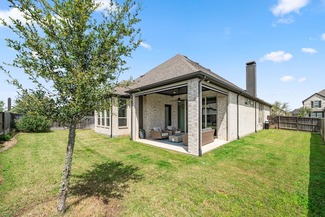 3019 Bluestem Rd, Katy, TX 77493 - back of property with outdoor lounge area, a fenced backyard, a ceiling fan, a patio, and brick siding