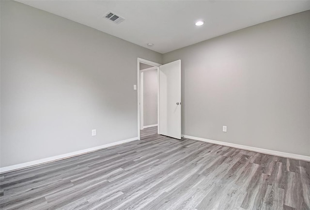7918 Battleoak Dr, Houston, TX 77040 - unfurnished room with wood finished floors and recessed lighting