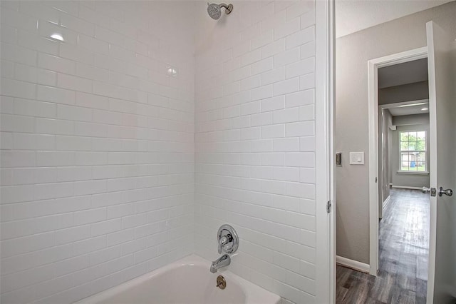 7918 Battleoak Dr, Houston, TX 77040 - full bath with washtub / shower combination and wood finished floors