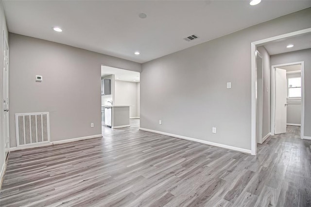 7918 Battleoak Dr, Houston, TX 77040 - empty room with recessed lighting and light wood-style flooring