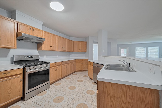2123 Gable Hollow Ln, Katy, TX 77450 - kitchen featuring stainless steel appliances, under cabinet range hood, light countertops, light tile patterned flooring, and a center island with sink