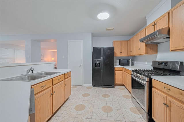 2123 Gable Hollow Ln, Katy, TX 77450 - kitchen featuring black refrigerator with ice dispenser, stainless steel gas range oven, ventilation hood, and light countertops
