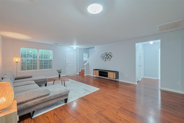 2123 Gable Hollow Ln, Katy, TX 77450 - living area with stairway and wood finished floors
