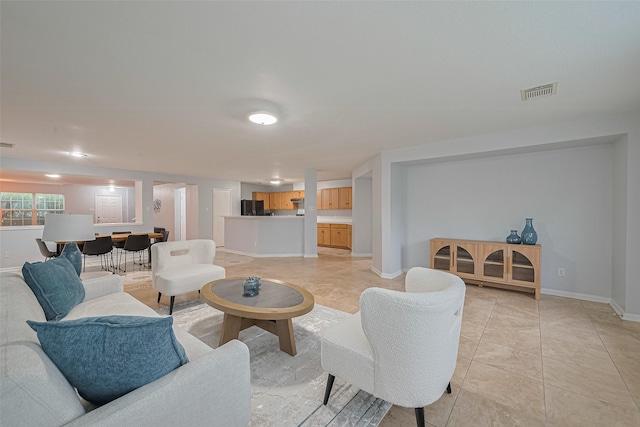 2123 Gable Hollow Ln, Katy, TX 77450 - living area featuring baseboards and light tile patterned flooring