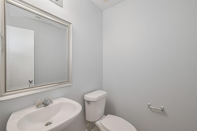 2123 Gable Hollow Ln, Katy, TX 77450 - half bath featuring a sink and toilet