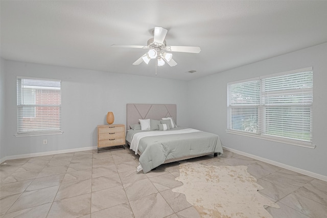 2123 Gable Hollow Ln, Katy, TX 77450 - bedroom featuring baseboards and a ceiling fan