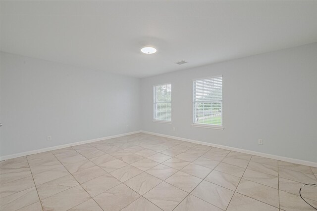 2123 Gable Hollow Ln, Katy, TX 77450 - spare room featuring baseboards