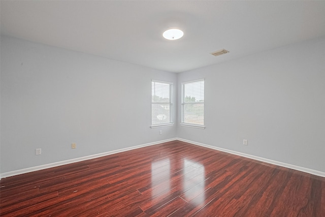2123 Gable Hollow Ln, Katy, TX 77450 - spare room featuring dark wood-style floors and baseboards